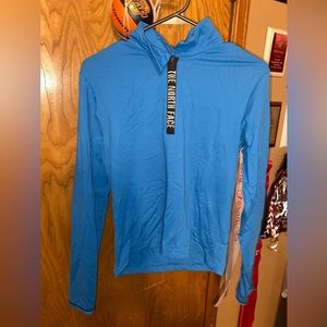 The North Face blue half zip up pullover